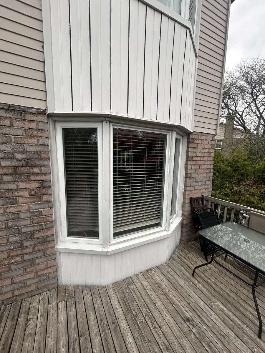 The ground-floor bay window over the deck before conversion