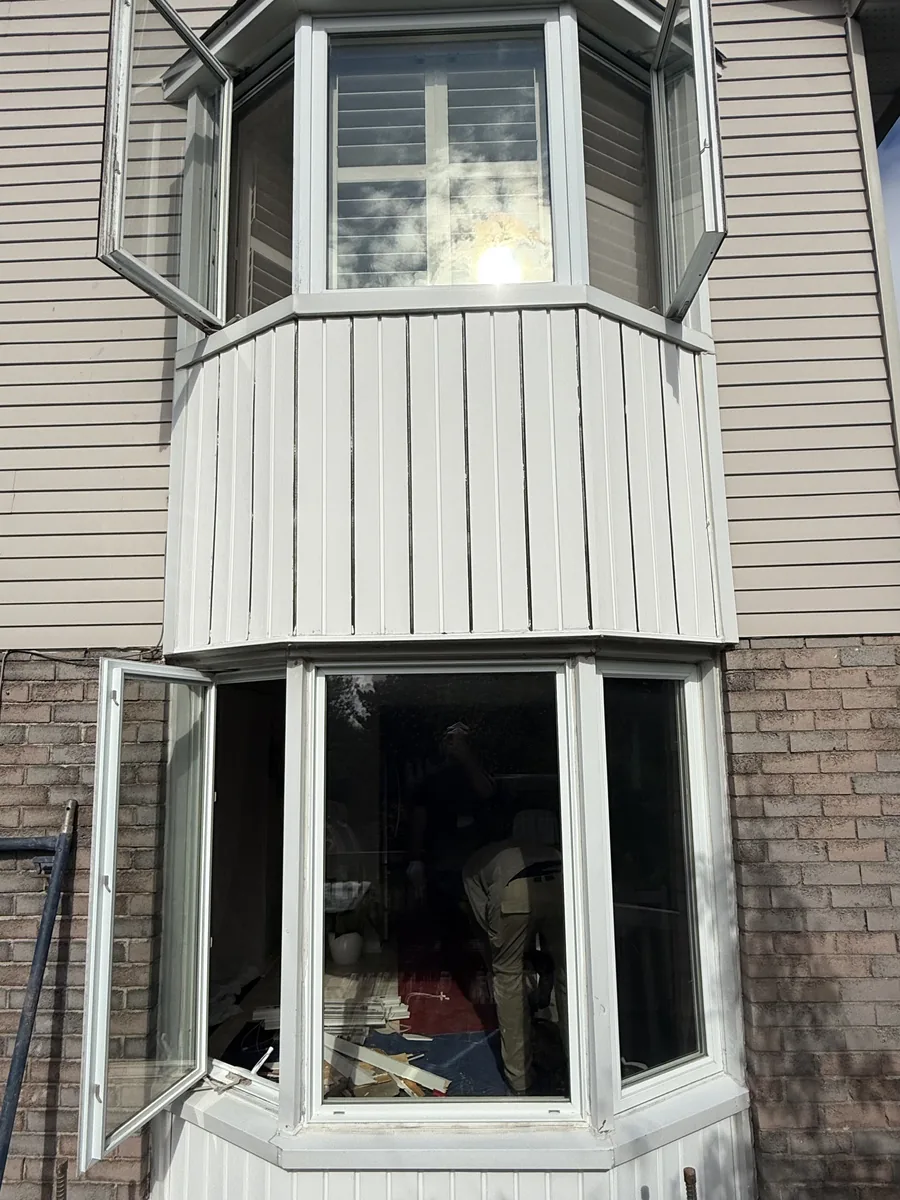 Both bay windows partially dismantled during the conversion