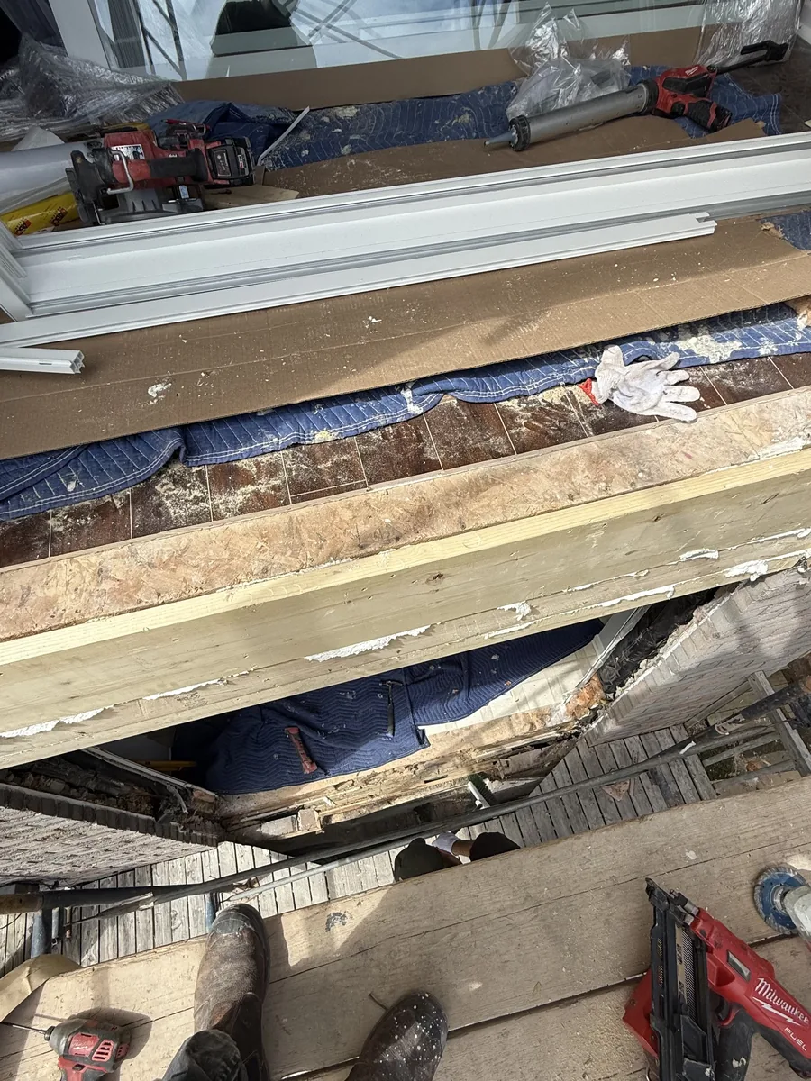 The new flat wall opening framed, insulated and wrapped before the door install